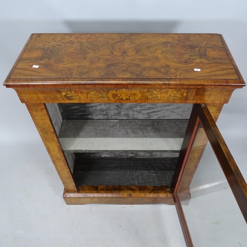 2243 - A Victorian walnut pier cabinet with single glazed door. 86cm x 108cm x 35cm (with key)