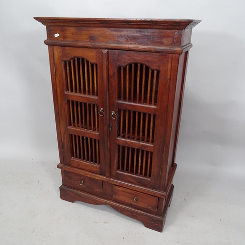 2244 - A modern oriental hardwood two-door side cabinet with two fitted drawers. 74cm x 110cm x 34cm (with ... 