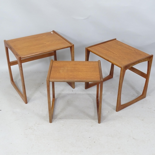 2249 - A mid-century G-plan nest of three teak occasional tables. Largestcm x 49cm x 43cm