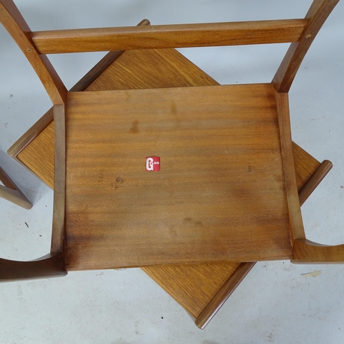 2249 - A mid-century G-plan nest of three teak occasional tables. Largestcm x 49cm x 43cm