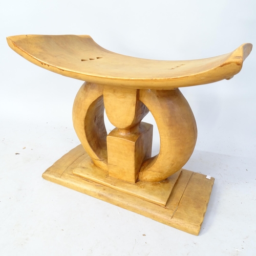 2258 - An African tribal Ashanti stool. 49cm x 42cm x 30cm