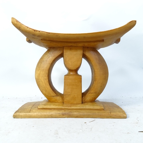 2258 - An African tribal Ashanti stool. 49cm x 42cm x 30cm