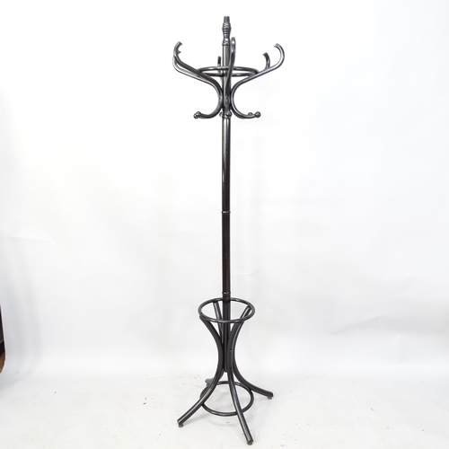 2259 - A black lacquered bentwood hat and coat stand in the manner of Thonet. 53cm x 185cm