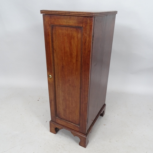 2275 - A mahogany single door cabinet, with shelf-fitted interior. 33 x 92 x 46cm.