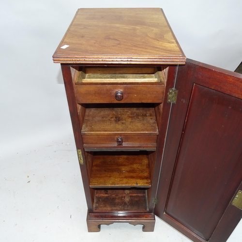 2275 - A mahogany single door cabinet, with shelf-fitted interior. 33 x 92 x 46cm.