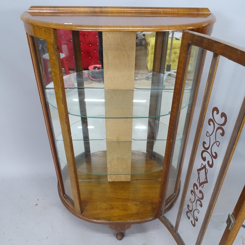 2279 - A 1930s mahogany display cabinet with single door and 2 glass shelves. 82 x 120 x 32cm. With key.