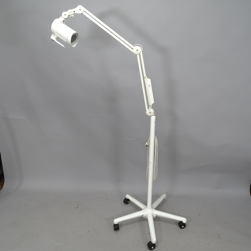 2281 - A Luxo LNH-11 posable examination light on stand. Maximum height 200cm.