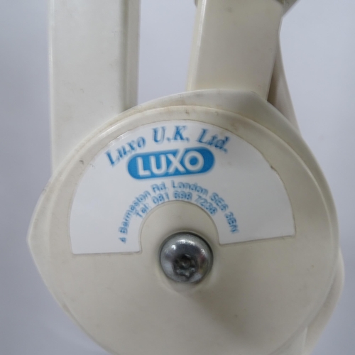 2281 - A Luxo LNH-11 posable examination light on stand. Maximum height 200cm.