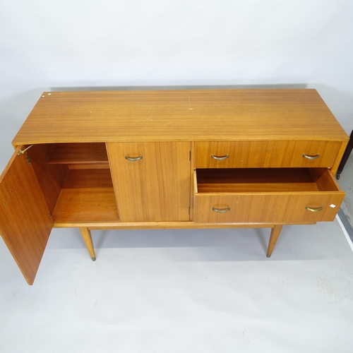 2501 - A mid century teak display cabinet with raised mirror back, two adjustable glass shelves and fitted ... 