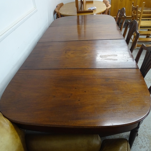 2503 - A Georgian mahogany D-end dining table with two spare leaves, 250cm (extended), x 73cm x 114cm, and ... 