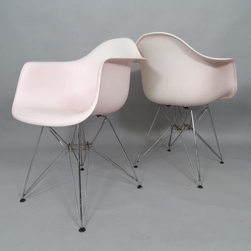 2506 - A pair of pink Eames style plastic shell armchairs on Eiffel base