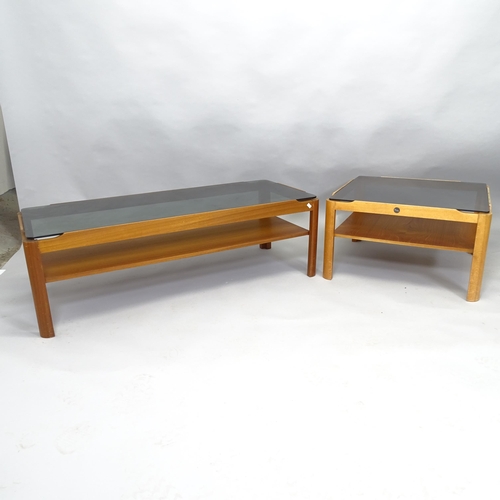 2508 - A mid-century teak two tier coffee table with inset smoked glass top, 113cm x 35cm x 48cm, and a squ... 