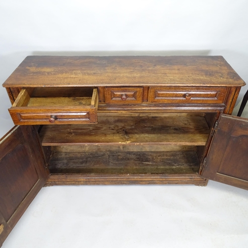 2515 - An early 20th century oak dresser base with three fitted drawers and cupboards under. 145cm x 103cm ... 