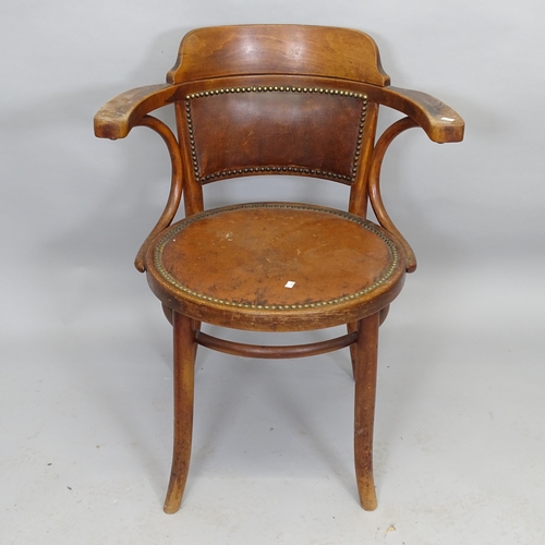 2528 - An early 20th century Thonet bentwood bow-arm chair, with studded red leather seat and impressed mak... 