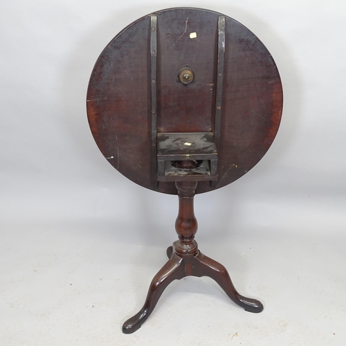 2530 - A Georgian mahogany circular tilt-top occasional table on tripod base, 70cm x 71cm