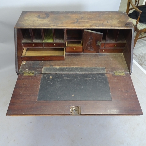 2561 - A Georgian mahogany bureau, the fall-front revealing a fitted interior, with 4 long drawers below, 1... 