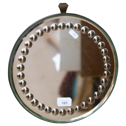 101 - A Vintage circular sorcerer's mirror, with a circular optic border, diameter 31cm