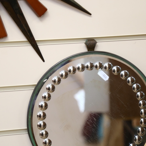 101 - A Vintage circular sorcerer's mirror, with a circular optic border, diameter 31cm