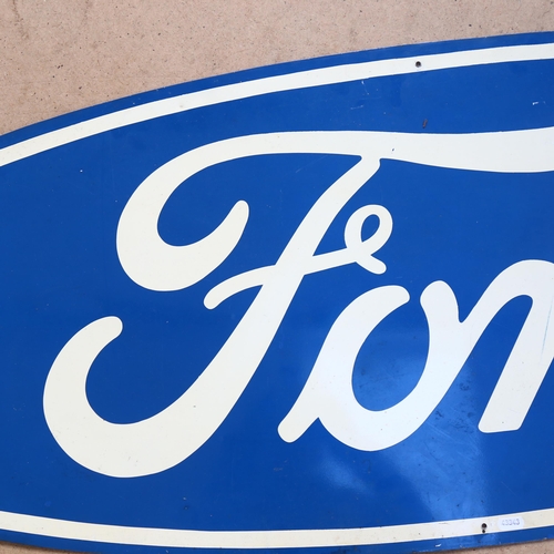 103 - A Vintage oval Ford advertising tin sign, length 152cm