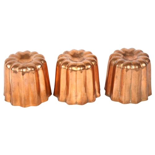 120 - 3 small fluted copper jelly moulds, diameter 5.5cm, height 5.cm