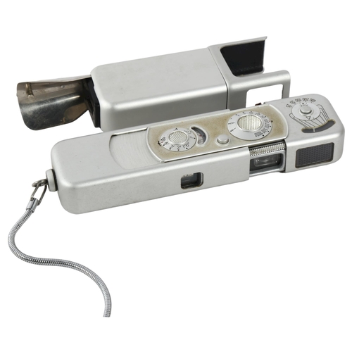 130 - A Minox Complan :3-5 15mm camera with chain, and a C4 cube flash adapter, both cased