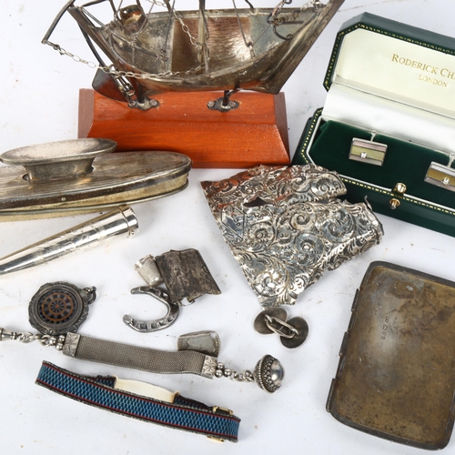 139 - A group of silver and other items, including a 925 silver yacht, silver-handled nail buffer, cufflin... 