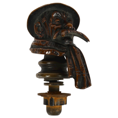 142 - An early 20th century cast-bronze car mascot 