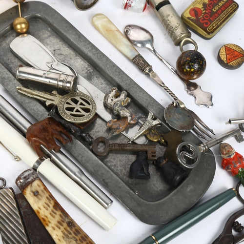 148 - A box of various collectables, including whistles, pens, a Liberty & Company pewter pen tray, boxes ... 