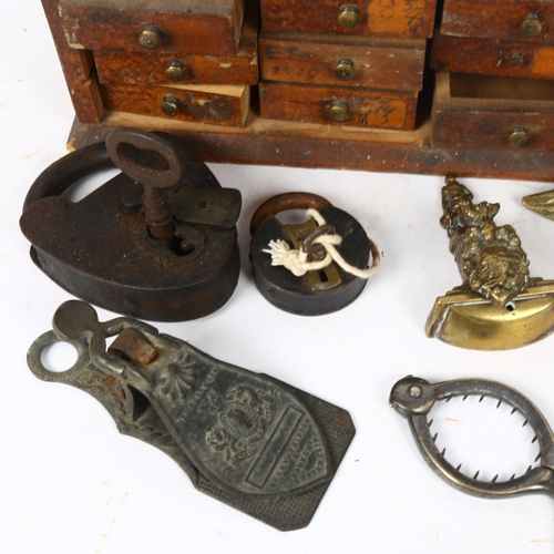 150 - A group of various items, to include a Victorian egg top opener, padlock and key, letter clip, minia... 