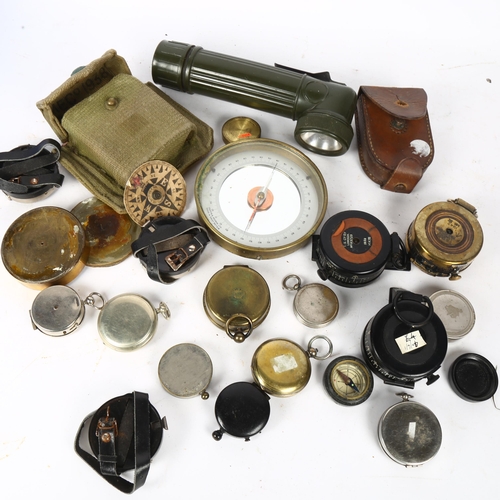 151 - A group of Vintage military and other compasses, including the Magnapole, and a 1942 brass compass b... 