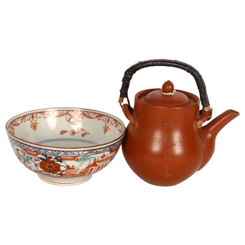 163 - A Chinese Yixing teapot with incised decoration, and a small 19th century bowl, diameter 15cm