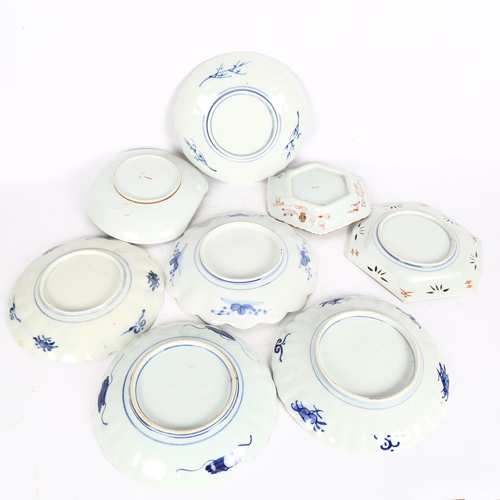 174 - A group of 6 Oriental Imari decorated plates, a Kutani dish, and another