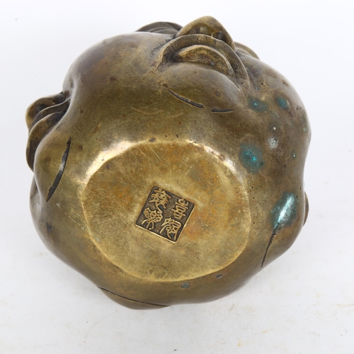 179 - A 20th century Japanese bronze paperweight, showing 4 faces of Buddha, with seal mark to the base, h... 