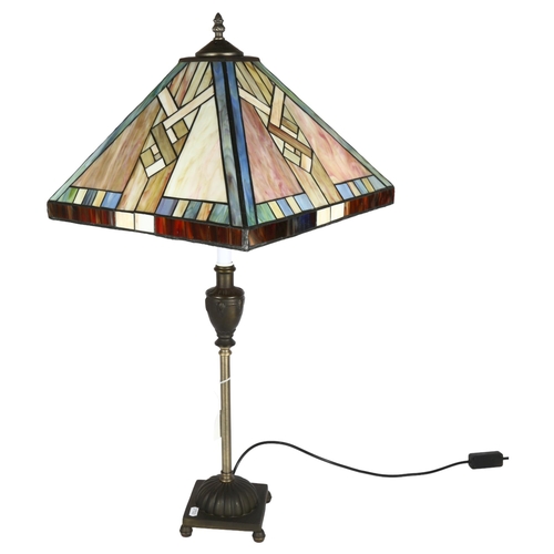 188 - A Tiffany style table lamp with coloured leadlight glass shade, height 80cm