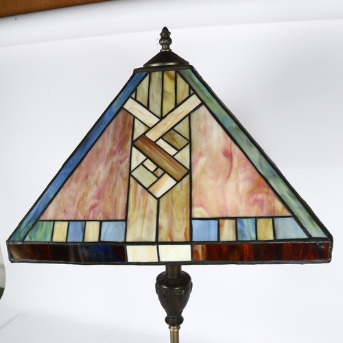 188 - A Tiffany style table lamp with coloured leadlight glass shade, height 80cm