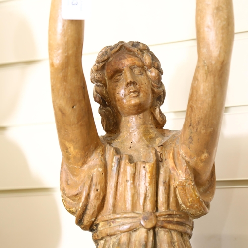 33 - An 18th century carved wood religious figure with outstretched arms, on later stand, height 93cm