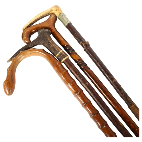 70 - A horn-handled walking cane, and 2 others, and a horn-handled riding crop (4)