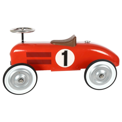 75 - A child's metal ride-on toy car, length 75cm