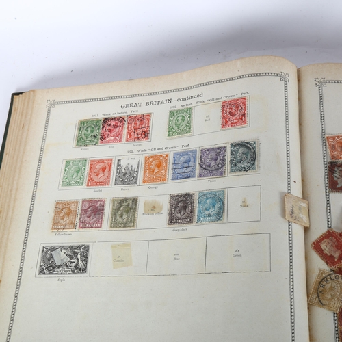 76 - THE IDEAL POSTAGE STAMP ALBUM - containing a Victorian Penny Black, lettered IL, some margins, vario... 