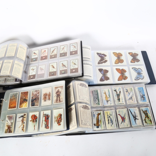 81 - 4 albums of WD & HO Wills Steven Mitchell & Son John Player & Sons cigarette cards, including raceho... 