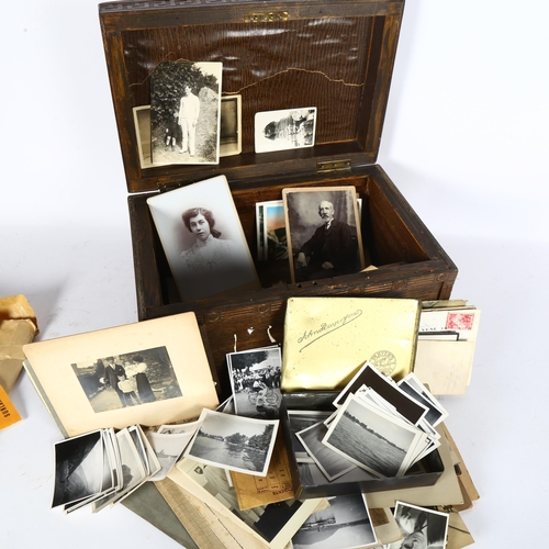 96 - A large collection of Vintage family and other photographs and postcards