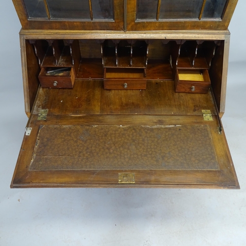 2531 - A 19th century mahogany two-section bureau bookcase, the fall-front revealing a fitted interior with... 