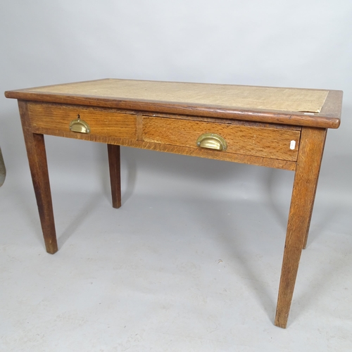 2539 - Wake and Dean - A 1930s oak writing table with two fitted drawers. 121cm x 78cm x 68cm