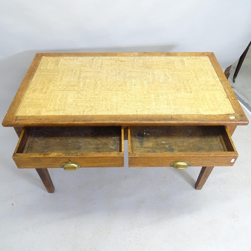 2539 - Wake and Dean - A 1930s oak writing table with two fitted drawers. 121cm x 78cm x 68cm