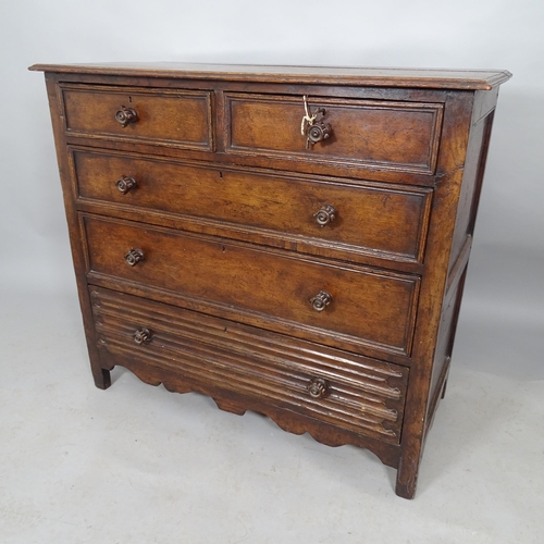 2544 - A 1920s oak chest of two short and three long drawers. 107cm x 96cm x 50cm