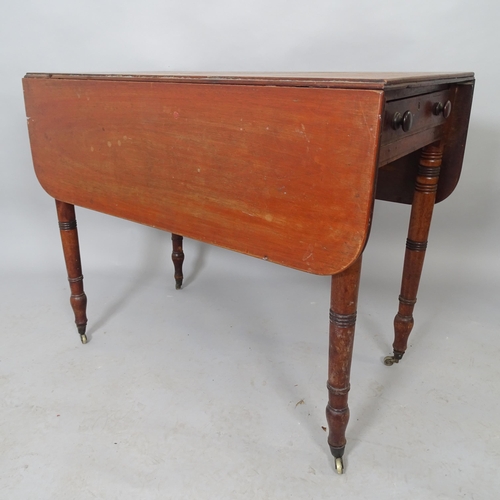 2545 - A 19th century mahogany pembroke table with end frieze drawer, raised on turned legs. 89cm x 71cm x ... 