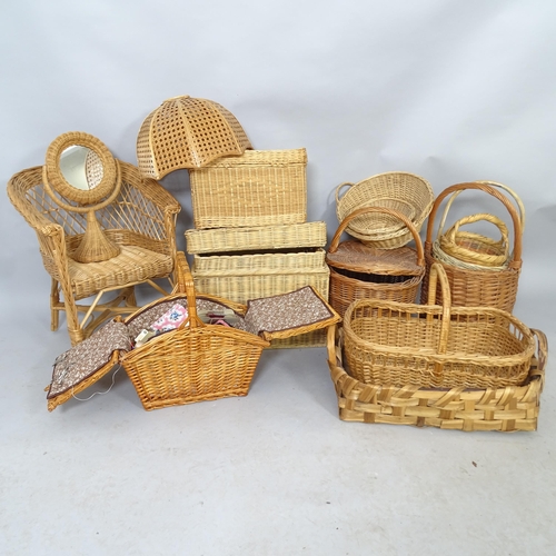 2562 - Various wicker baskets including a sewing basket and contents, a mirror, a child's chair etc.