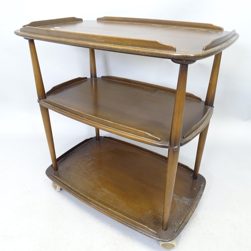 2569 - An Ercol three-tier tea trolley. 70cm x 75cm x 47cm