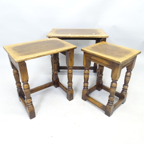 2574 - An Ipswich Oak design nest of three occasional tables. Largest 53cm x 50cm x 36cm