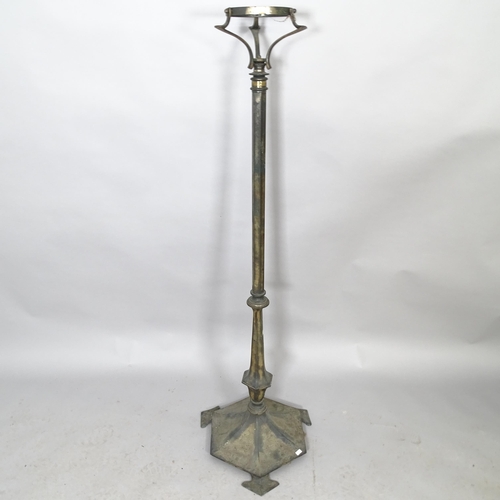 2579 - A 1930s Art Deco cast metal and patinated standard lamp. Height overall 138cm